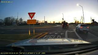 Driver Fails to Maintain Lane thru Roundabout