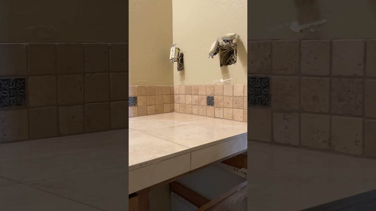 I-TILE ITALIAN TRAVERTINE VANITY WITH CUSTOM BACKSPLASH 