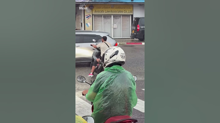 Tourist takes selfie on motorcycle before crashing into traffic