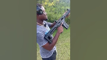 AR-12 knocking down steel 💪🏿 #viral #shorts #ar12 #gun