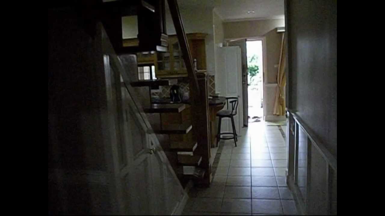 Ghost caught on tape in a house for sale [HD] - YouTube