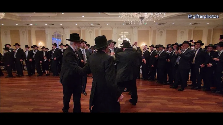 Rav Shmuel whispers to Chosson that he should danc...