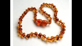 Collar de ambar para el dolor de dientes - YouTube
