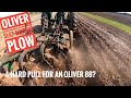 Oliver Row Crop 88 pulling a 4 bottom slat bottom plow