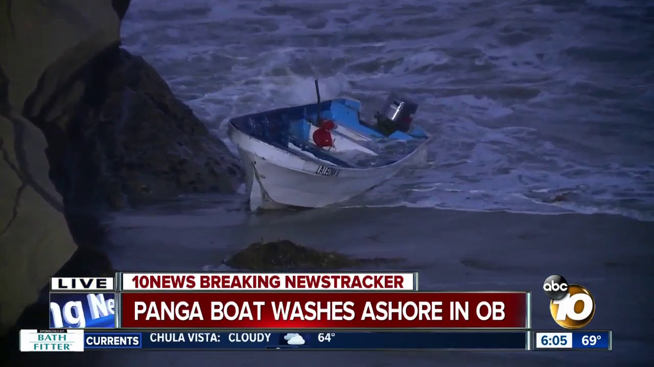 Panga boat washes ashore in Ocean Beach - YouTube