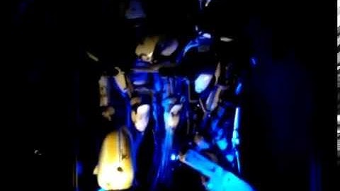 ThreeA Portal 2 1/6 scale Robots Atlas and P-body in hug position in lighted Display Case