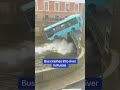 Bus crashes into river in Russia image