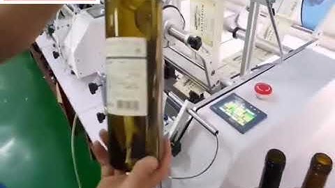 Semi automatic red wine round bottle labeling machine label applicator Music