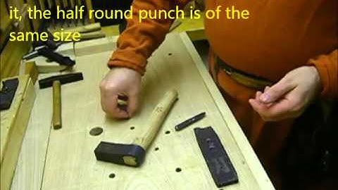 Demonstration of the medieval cupping anvil and punch