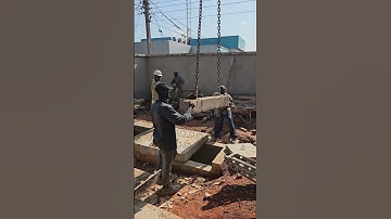 Installation of prefabricated concrete beams #africa #ghana #construction #site #concreting