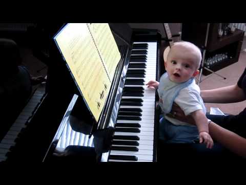 5 month old Ryan playing piano and singing