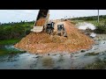 Specializing Road Building Operator Bulldozer Moving Soil Cover On Wetland, SHANTUI SD13