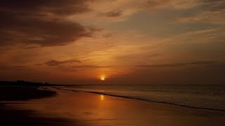 A Sunset on the beach at Castle Bamburgh, English Countryside 4K