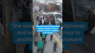 Chilling video shows security officer save woman from oncoming train in Turkey