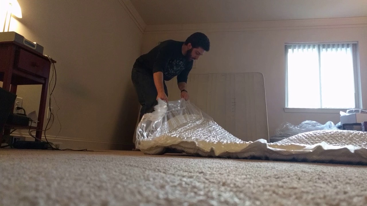 unboxing a purple mattress