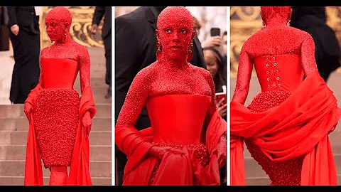 Singer Doja Cat covers herself in red paint, 30,000 crystals at Paris Fashion Week