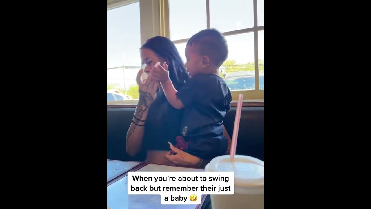 Toddler Slaps Mother In Face While Playing 1414940