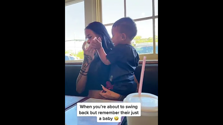 Toddler Slaps Mother in Face While Playing - 1414940