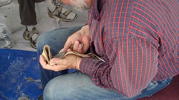 Dr. Bruce Bradley Knapping a Clovis Point