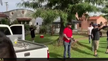 Man Who Pulled Rifle on Protesters on Camera Charged