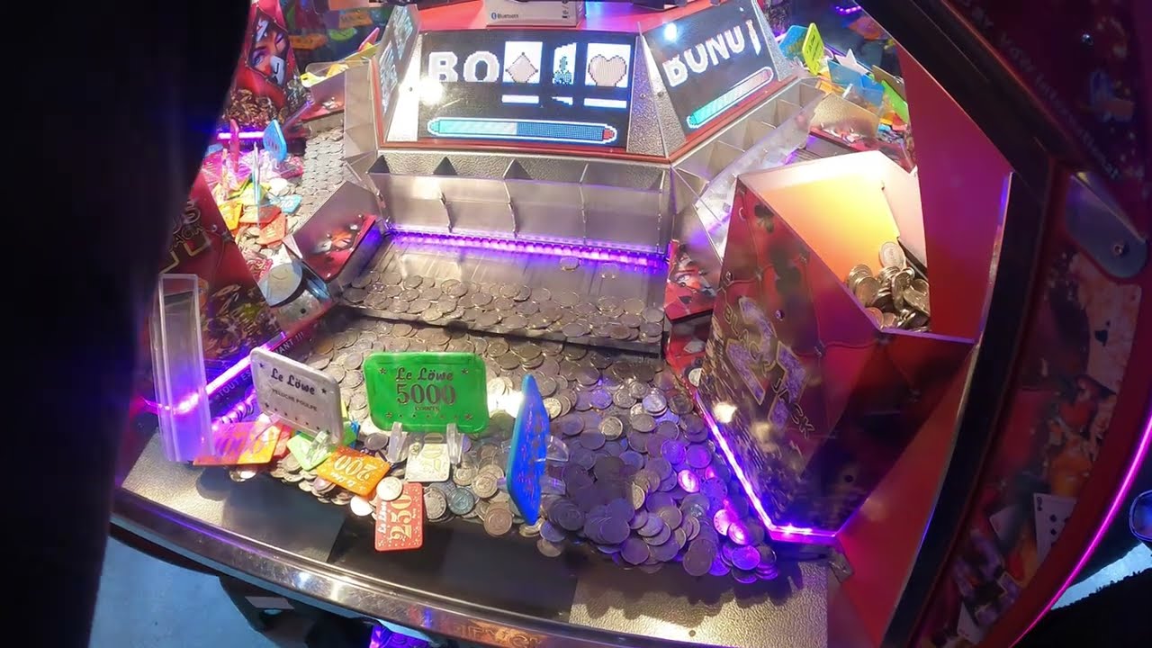 Machine Pousse pieces le lowe à la fête foraine à Saint Malo (sainte-ouine) épisode 2/3