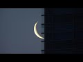 ビルに侵入する月