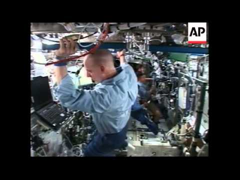 unfolding-of-solar-rays-on-space-station,-ground-control-reax