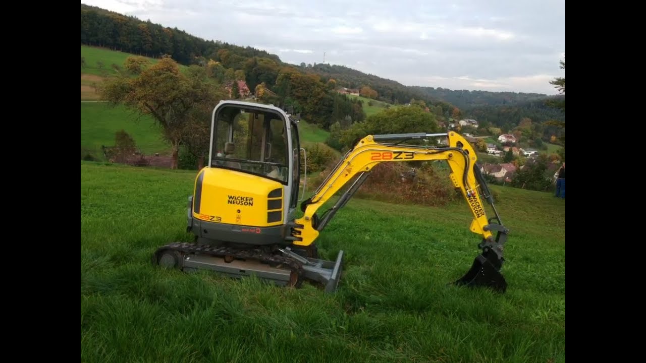 Hydraulische Heckenschere Ghedini BT51 am Minibagger Neuson ET18 vom Mietpark Schwäbischer Wald GbR