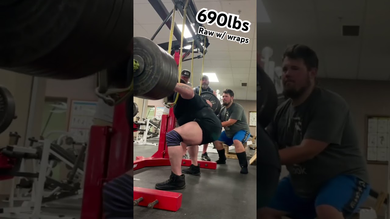 690lb squat raw with wraps 