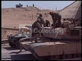 M1A2 Abrams crossing back into the wire after being hit. Iraq 2004