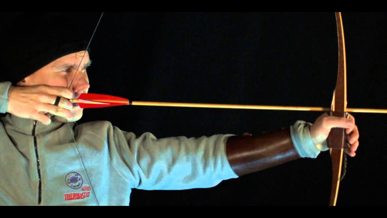 Slow motion video of primitive archery, nocking point height is just