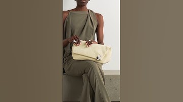 JIL SANDERE mbellished leather clutch.