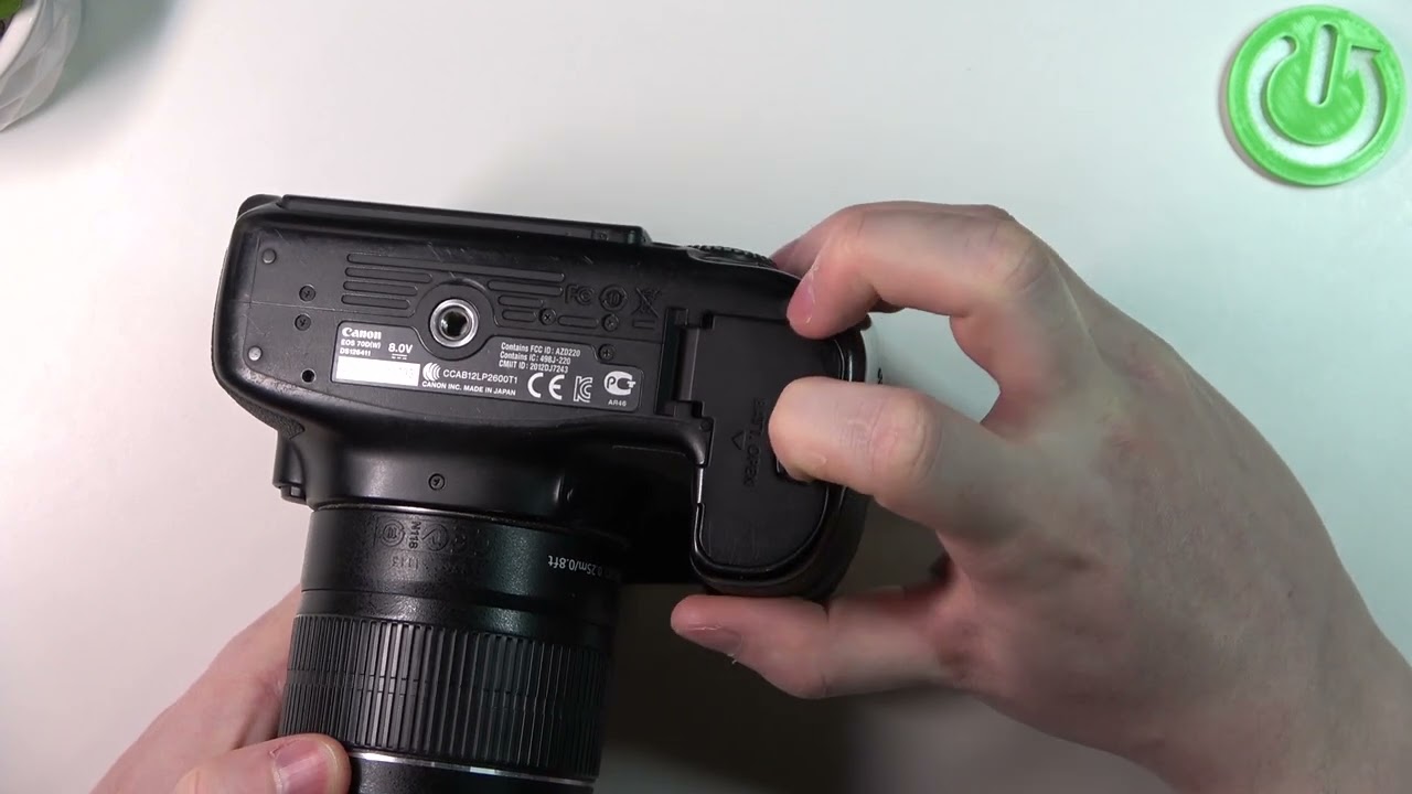 How To Open Battery Slot On Canon 70D Camera - YouTube