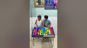 Puzzle sort ball game challenge with two Smarts player Tey vs nout