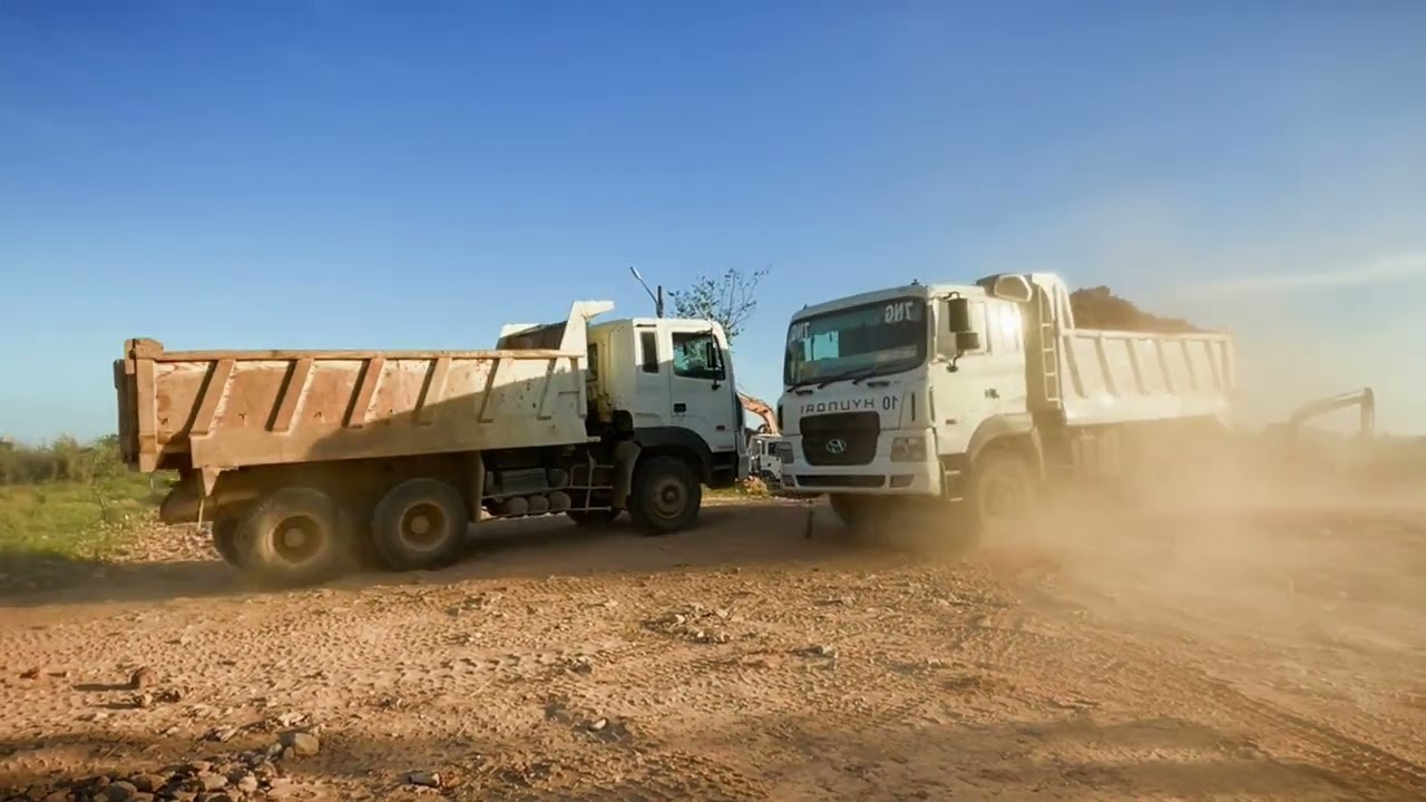 New place Caterpillar 385C Excavator Loading Coal Onto 4 Axle Trucks -Interkat SA