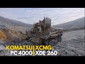 Powerful Machines in Action Japanese Komatsu PC4000 Excavator Loading Chinese XCMG XDE260 Dump Truck