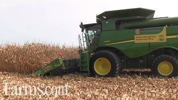 John Deere S680 Combine Harvesting Corn in Field Demo at Farm Progress Show 2015