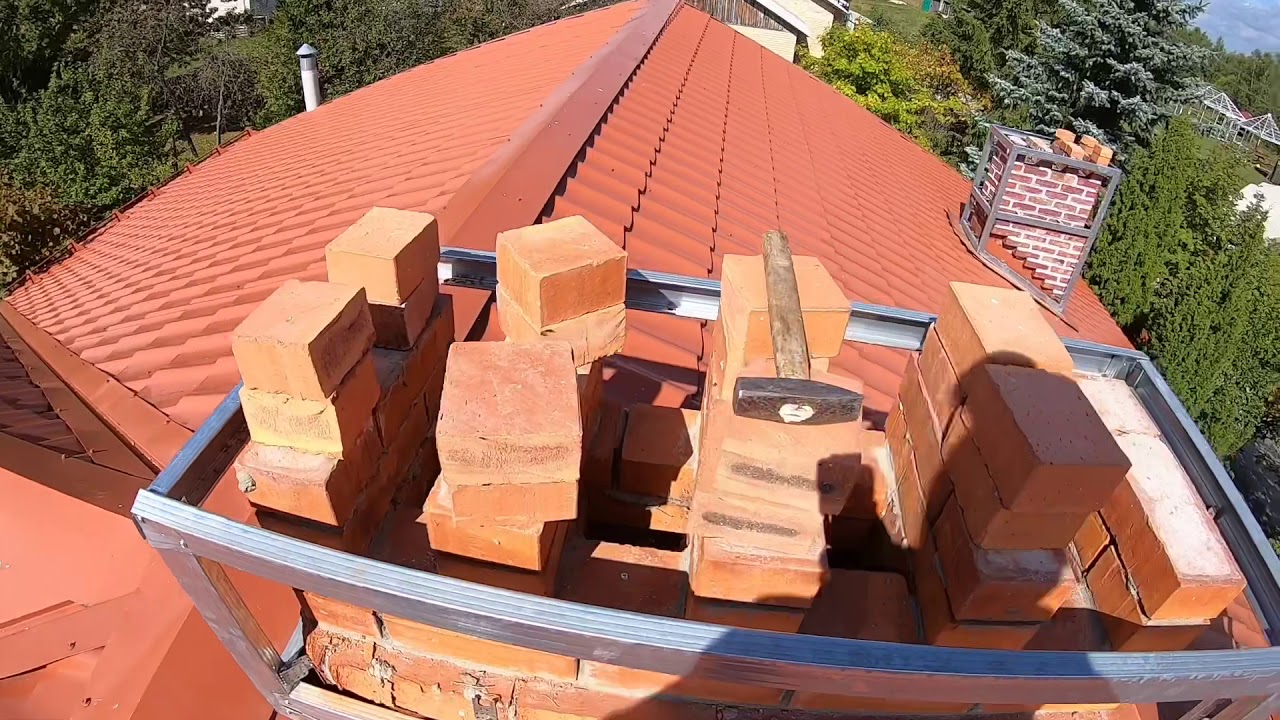 Облицовка дымохода на крыше камнем - 84 фото