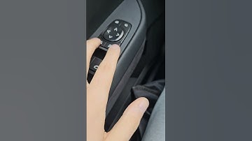 How to make the Fisker Ocean side mirros tilt when in reverse for better visibility.