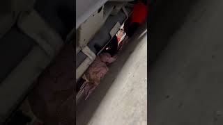 Woman finds her baby girl stuck underneath car in garage