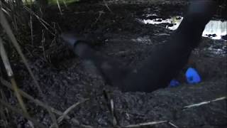 Diving into soft mud with jods and rubber boots