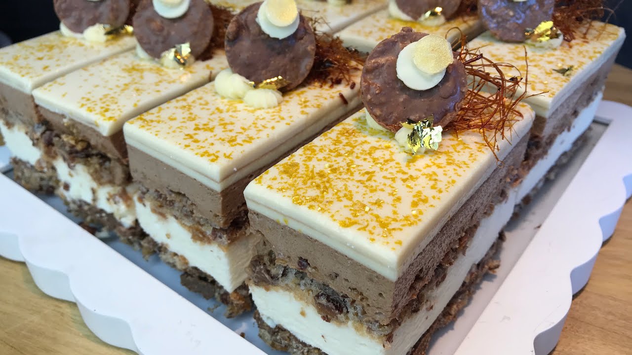 Crispy Almond Meringue Layer Cake/كعكة طبقة الميرانغ المقرمشة باللوز