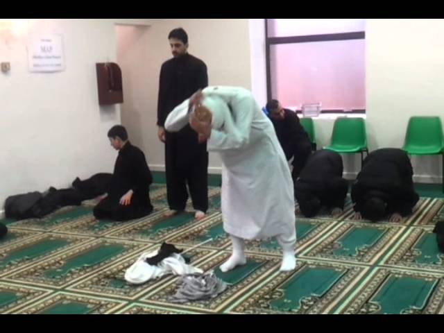 Sunni, Deoband, Wahabi Praying in a Shia mosque during Muharam Juloos: great sign of unity class=