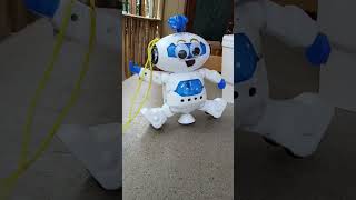 A old video my naughty robot dancing right near to a yellow taco truck