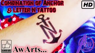 Letter N tattoo | N letter tattoo with anchor | anchor tattoo ideas with n letter | anchor tattoo