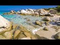 Gentle waves on a small white rock beach  relaxing ocean sounds