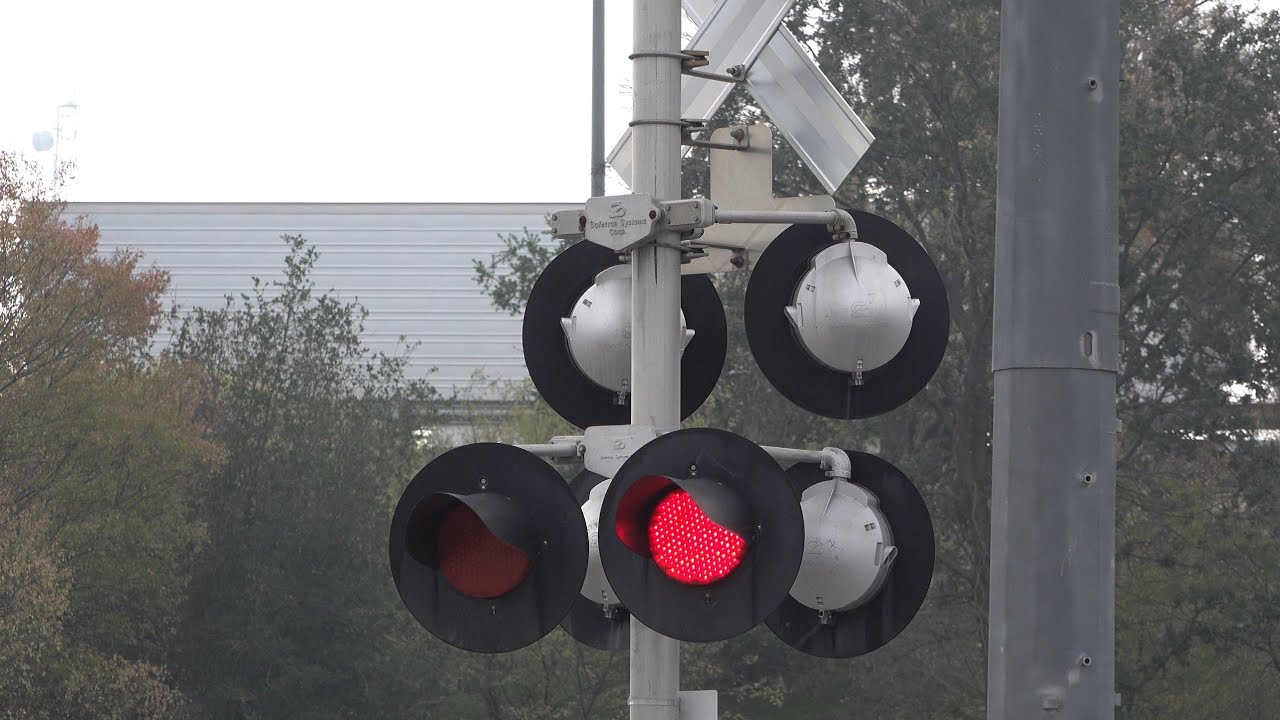 Redding Avenue Railroad Crossing Sacramento CA SACRT Light Rail Gold redding-avenue-railroad-crossing-sacramento-ca-sacrt-light-rail-gold