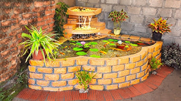 Bừng sáng góc vườn nhỏ với mẫu bể cá thác nước đẹp