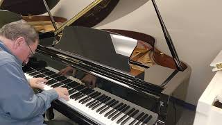 Petite Ebony Baby Grand Piano on sale