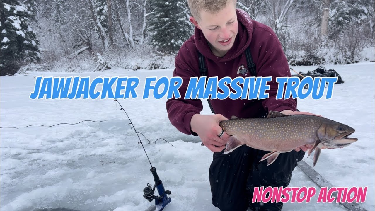 Ice fishing MASSIVE trout with JAW JACKERS, BEST ice fishing tool